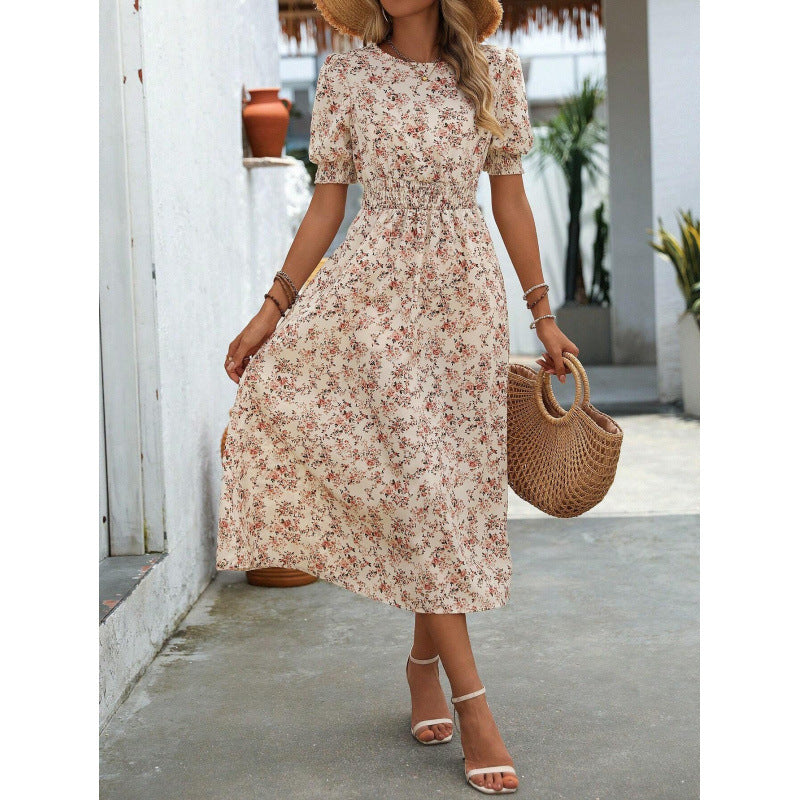 Amelia | Dress with round neckline and floral pattern