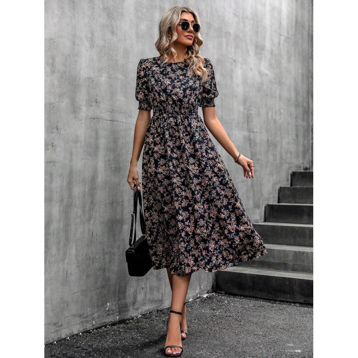 Amelia | Dress with round neckline and floral pattern