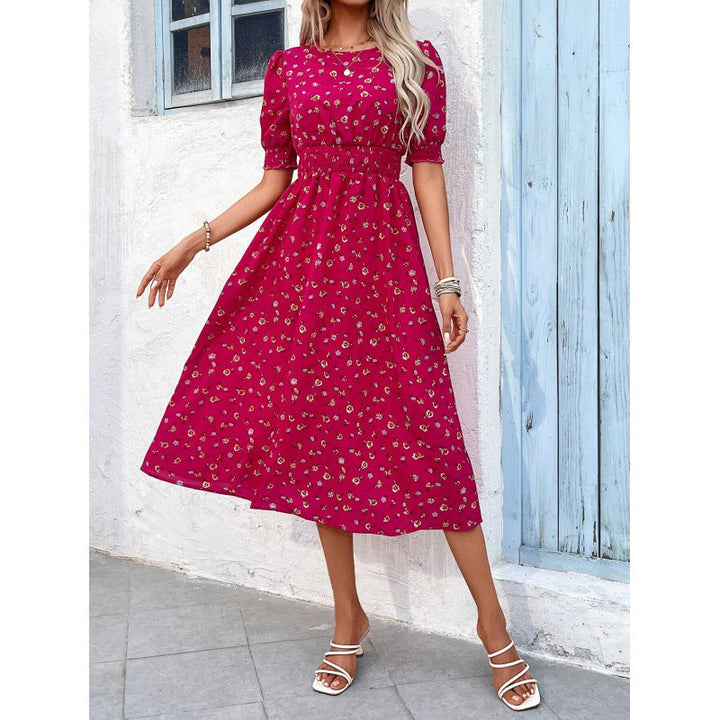Amelia | Dress with round neckline and floral pattern
