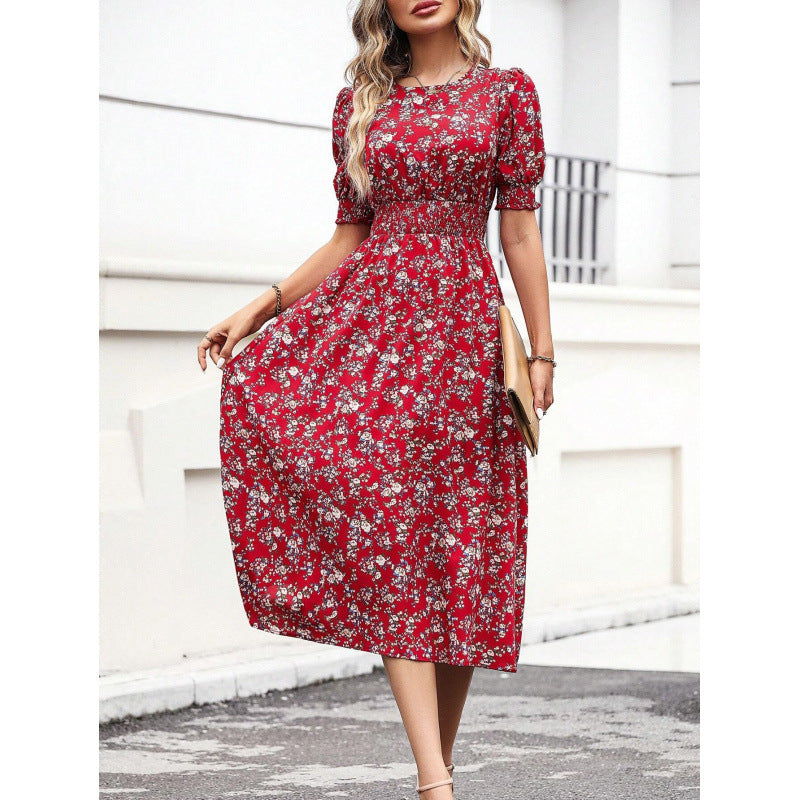 Amelia | Dress with round neckline and floral pattern