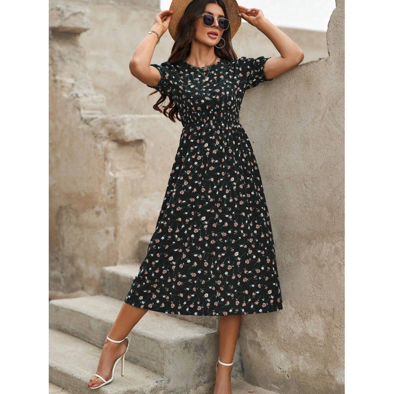 Amelia | Dress with round neckline and floral pattern