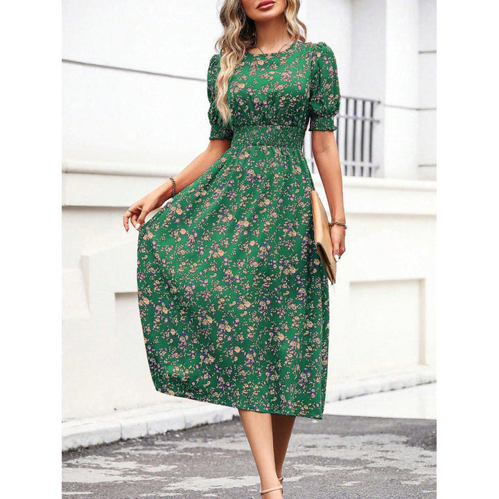 Amelia | Dress with round neckline and floral pattern