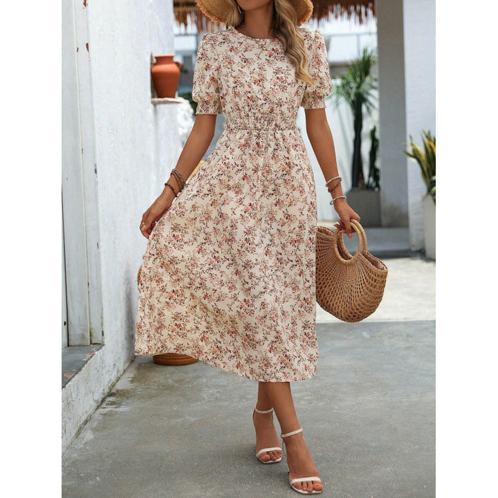 Amelia | Dress with round neckline and floral pattern
